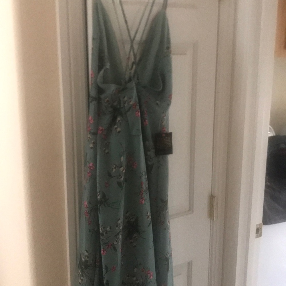 BEBE maxi dress with slits at bith side.